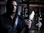 Raising fists and devil's horn signs on the new CD